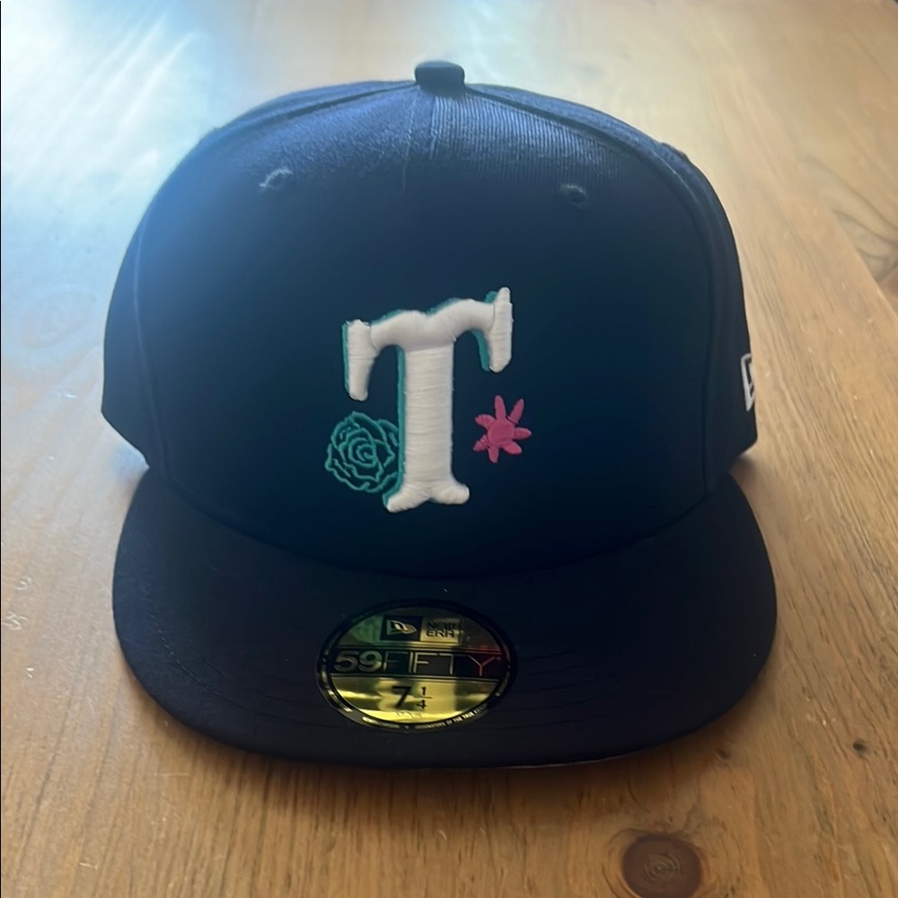New Era Black Cap with White and Blue Floral Design